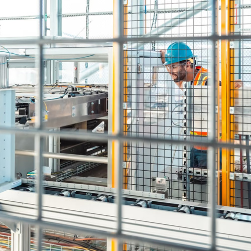 Man in hard hat in building