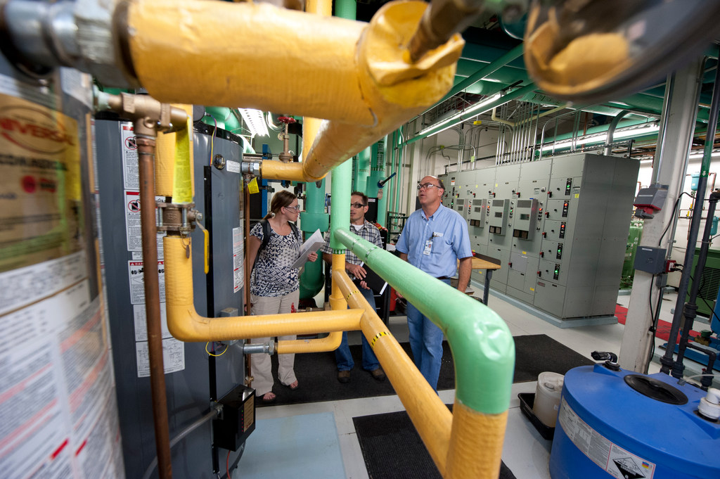 Jennifer Daw, Ken Proc and Chris Gaul perform an energy and water audit of the SERF.